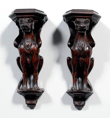 Appraisal: Pair carved griffin brackets well carved mahogany figures Continental or