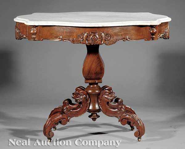 Appraisal: An American Rococo Carved Mahogany Center Table mid- th c