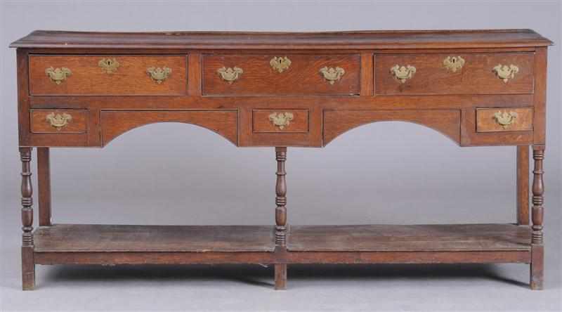 Appraisal: VICTORIAN OAK DRESSER BASE The two-plank top above double arch