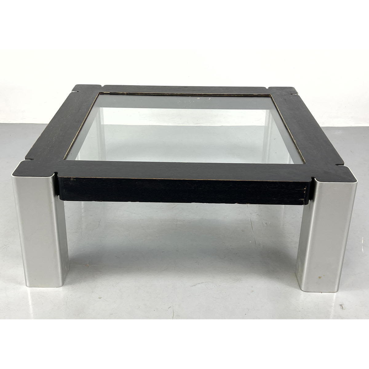 Appraisal: Square Glass coffee table extruded aluminum legs and ebonized Cerused