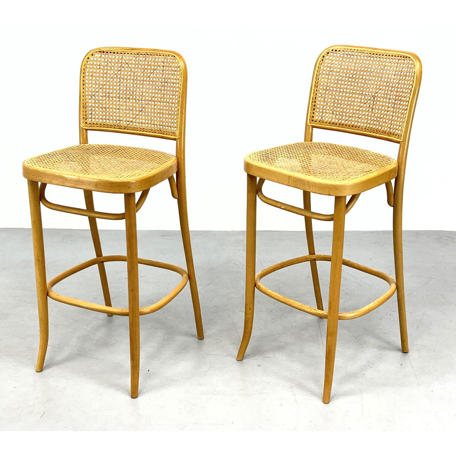 Appraisal: Pr Bentwood Bar Stools Caned seat and back Stendig style