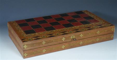 Appraisal: A red black and brown tooled gilt leather chess backgammon