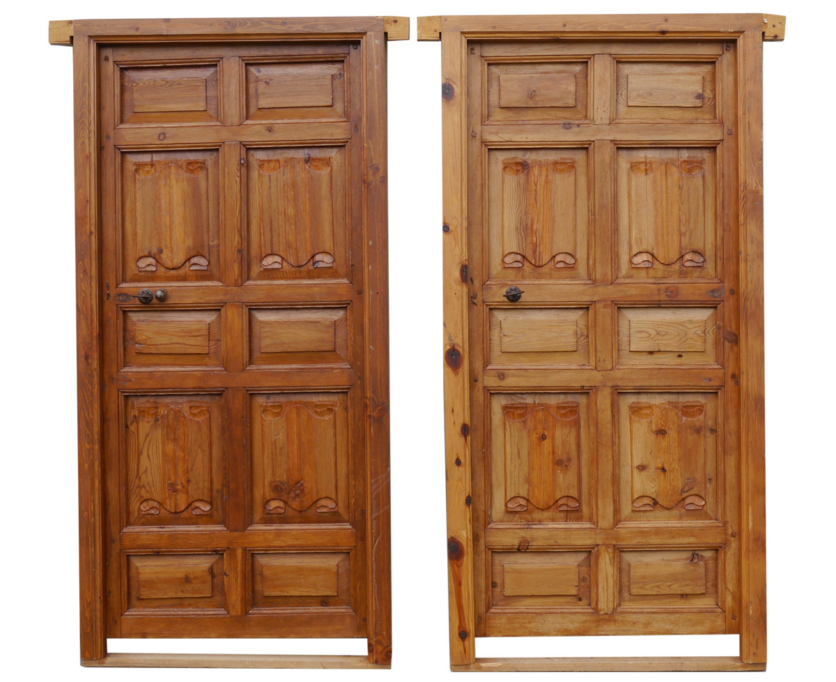 Appraisal: PAIR CARVED SPANISH COLONIAL STYLE DOORS With iron hardware Door