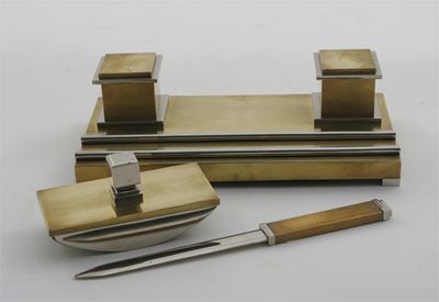 Appraisal: A bronze and chrome plated desk set comprising paperknife double