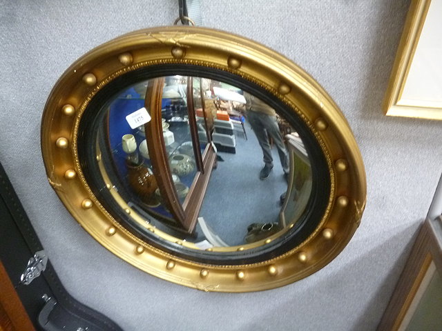 Appraisal: A REGENCY STYLE CIRCULAR GILT FRAMED CONVEX WALL MIRROR cm