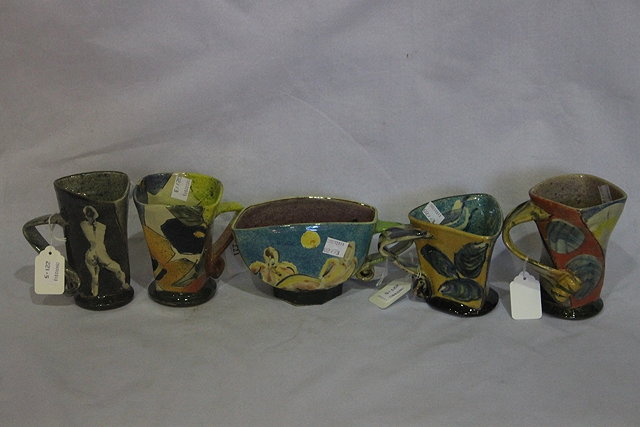 Appraisal: FIVE PAUL JACKSON STUDIO POTTERY MUGS decorated with nude figures