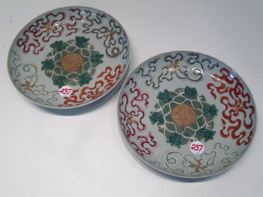 Appraisal: PAIR OF CHINESE PORCELAIN DISHES with hand painted central medallions