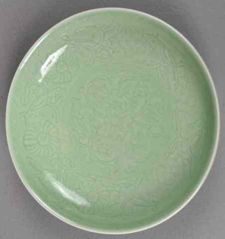 Appraisal: Chinese Celedon Porcelain PlatePorcelain dish with celedon glaze over incised