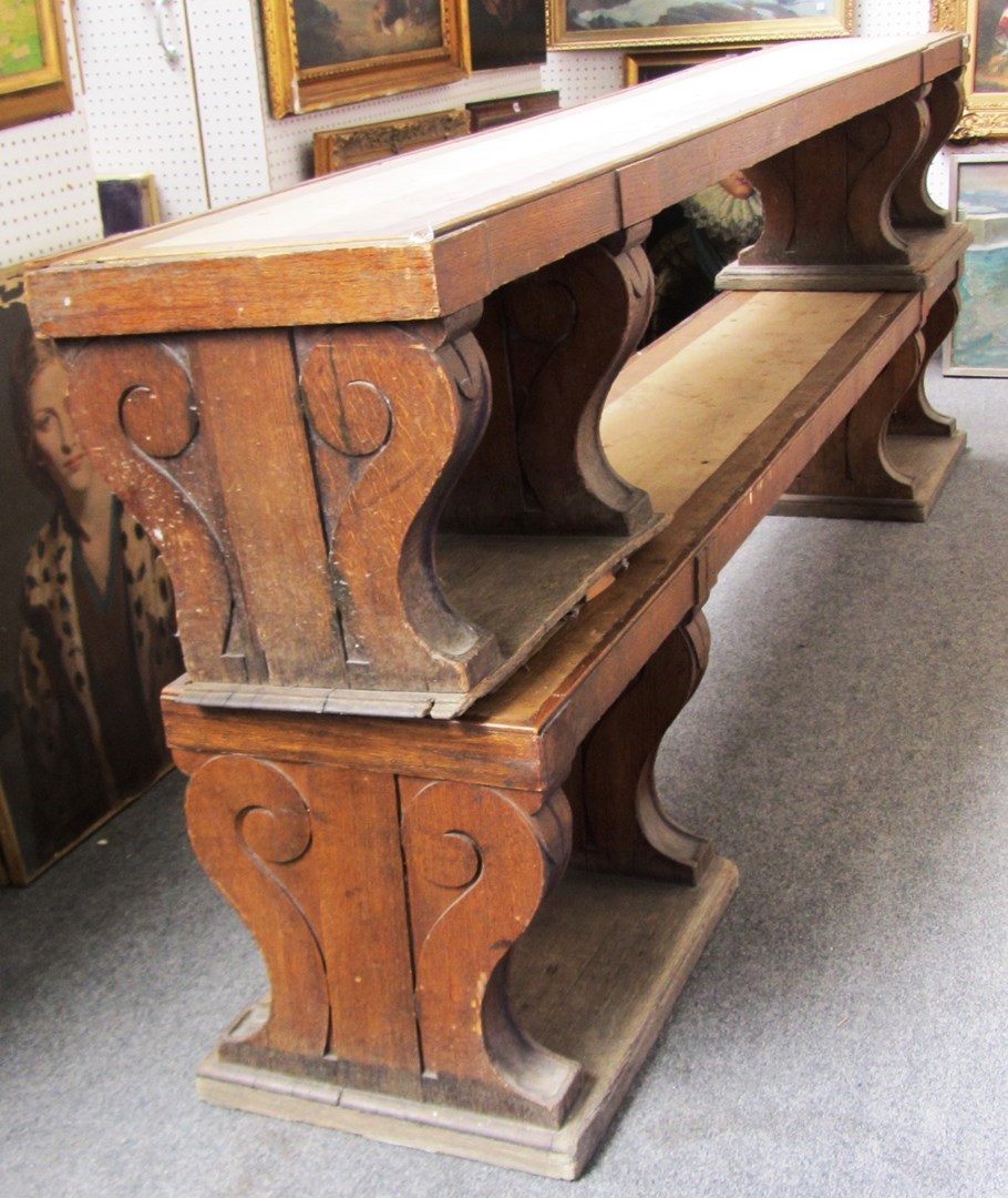 Appraisal: A pair of Victorian oak rectangular benches each on double