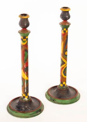 Appraisal: A pair of painted and decorated turned wood candlesticks on