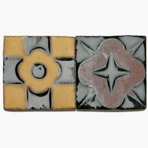 Appraisal: GRUEBY Seventy-one geometric tiles Forty-two with a raised floral and