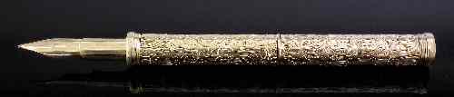 Appraisal: A late Victorian gold coloured metal cylindrical combined pen and