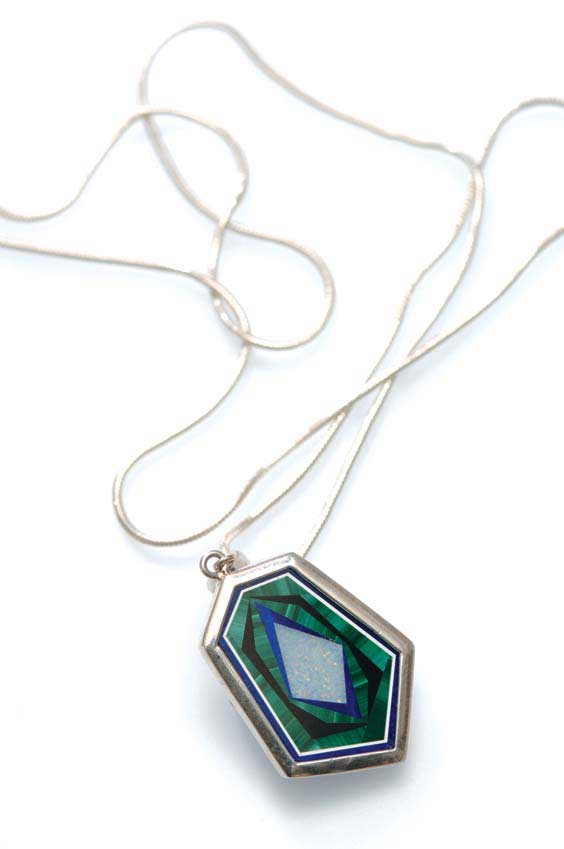 Appraisal: INTARSIA INLAID PENDANT Silver mounted intarsia pendant of malachite lapis