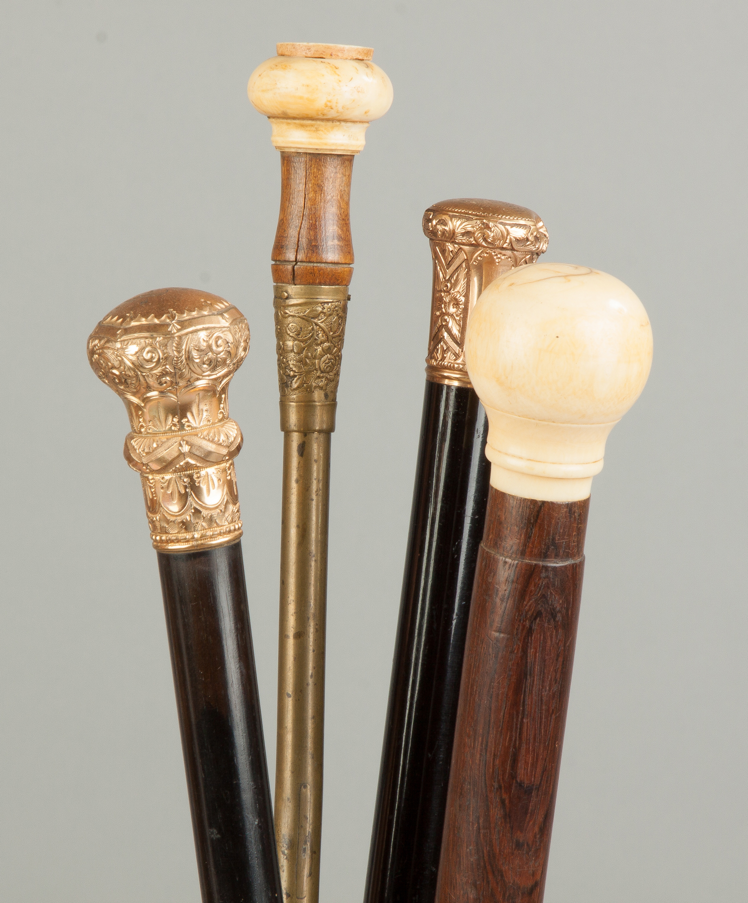 Appraisal: Group of Four Vintage Canes One presentation One sword cane