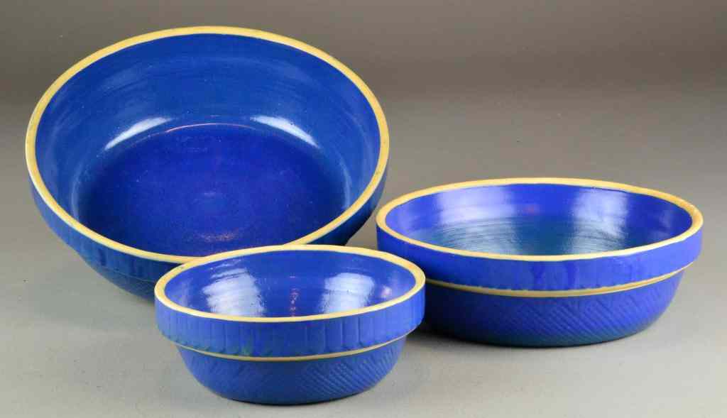 Appraisal: American Stoneware Baking BowlsOf graduated sizes glazed medium blue unmarked