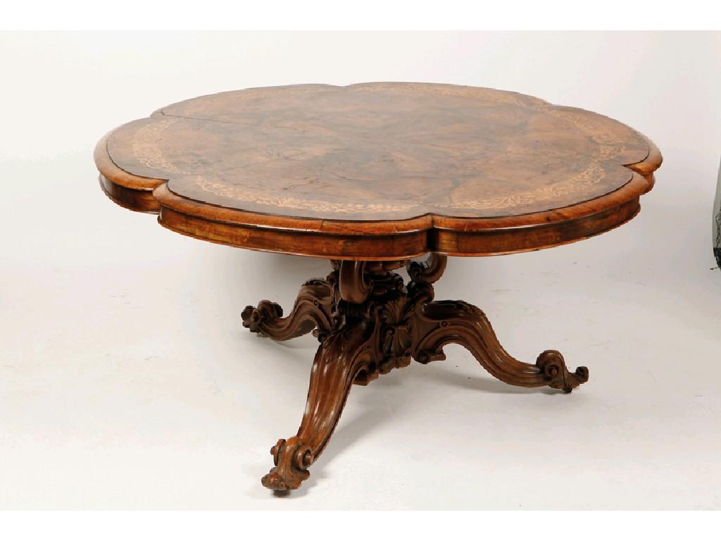 Appraisal: A VICTORIAN BURR WALNUT AND MARQUETRY BREAKFAST TABLE the six