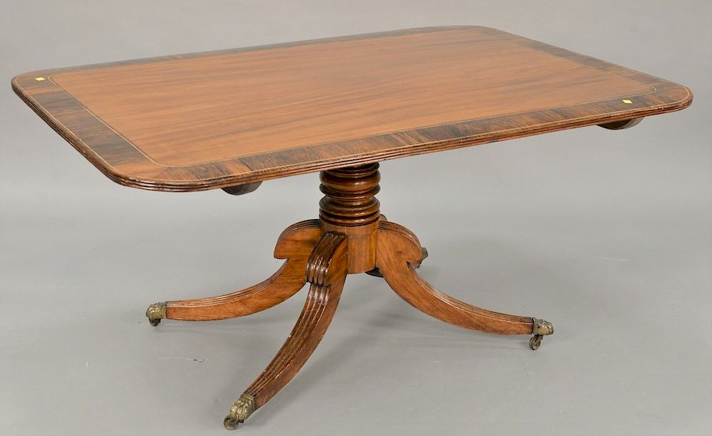 Appraisal: Mahogany breakfast tip table with rose wood banded top cracking