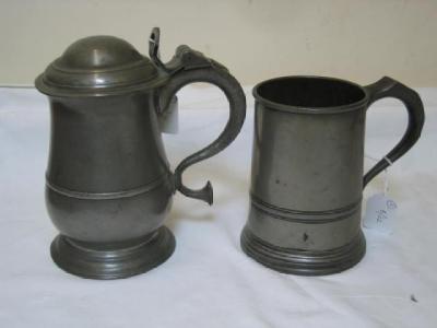 Appraisal: A PEWTER BALUSTER TANKARD the hinged domed cover with open