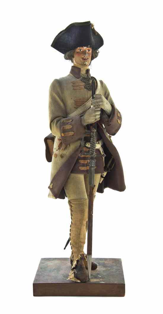 Appraisal: A French Carved Wood Military Figure Marcel Clesinger late th