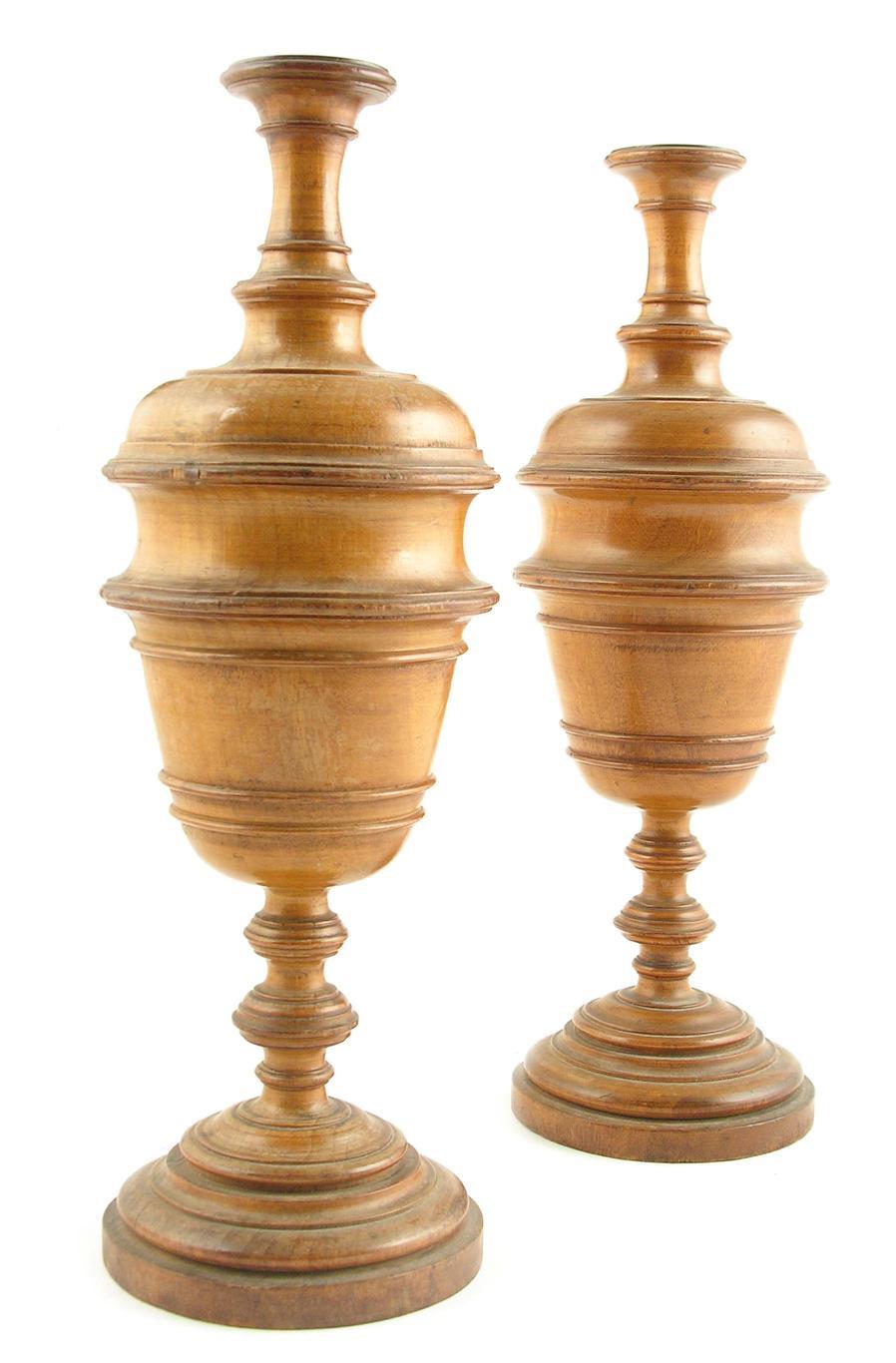 Appraisal: A pair of Victorian turned walnut ornamental vases