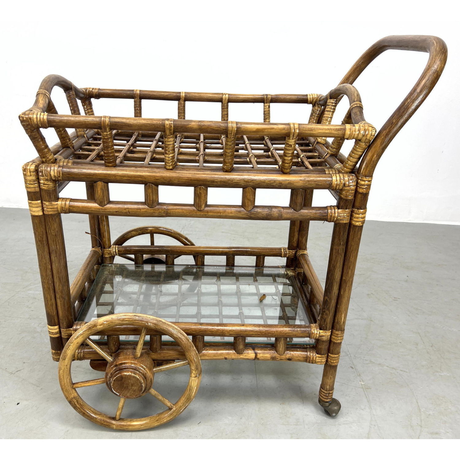 Appraisal: Bamboo wicker rattan rolling bar serving cart with removable tray