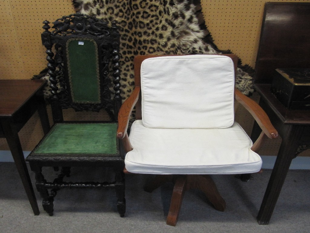 Appraisal: Chinese rosewood veneered swivel armchair and a hall chair