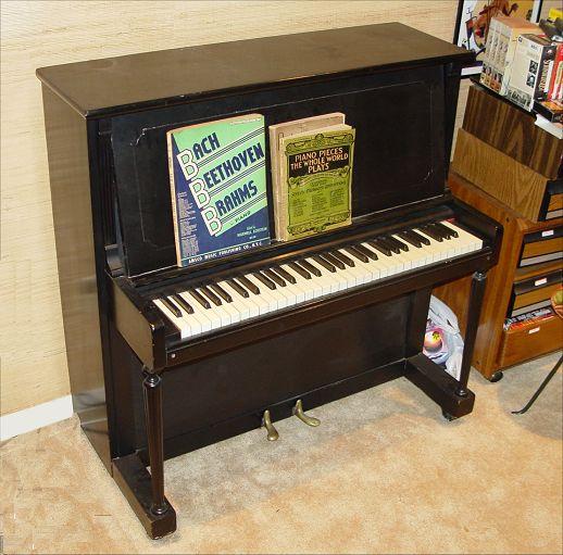 Appraisal: WURLITZER TOM THUMB CHILDS UPRIGHT PIANO keys black painted finish