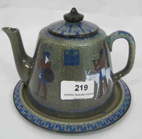 Appraisal: Royal Doulton Titanian Teapot and stand decorated with Tutankhamens Treasures