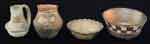 Appraisal: FOUR SMALL SOUTHWEST POTTERY VESSELS Small undecorated bowl with a