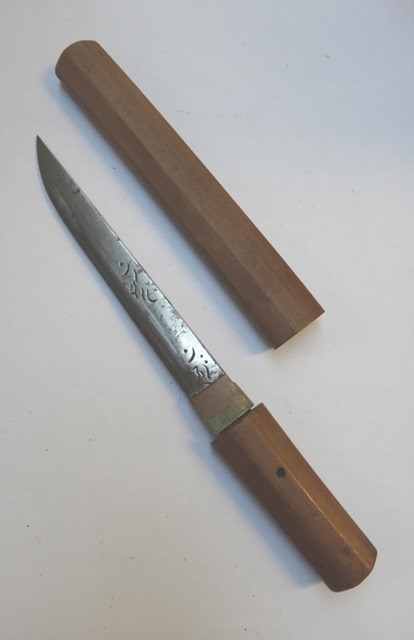 Appraisal: A Japanese tanto single edged blade engraved with fishing nets