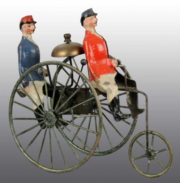 Appraisal: Tin Hand-Painted Men on Bicycle Wind-Up Toy Description German Working