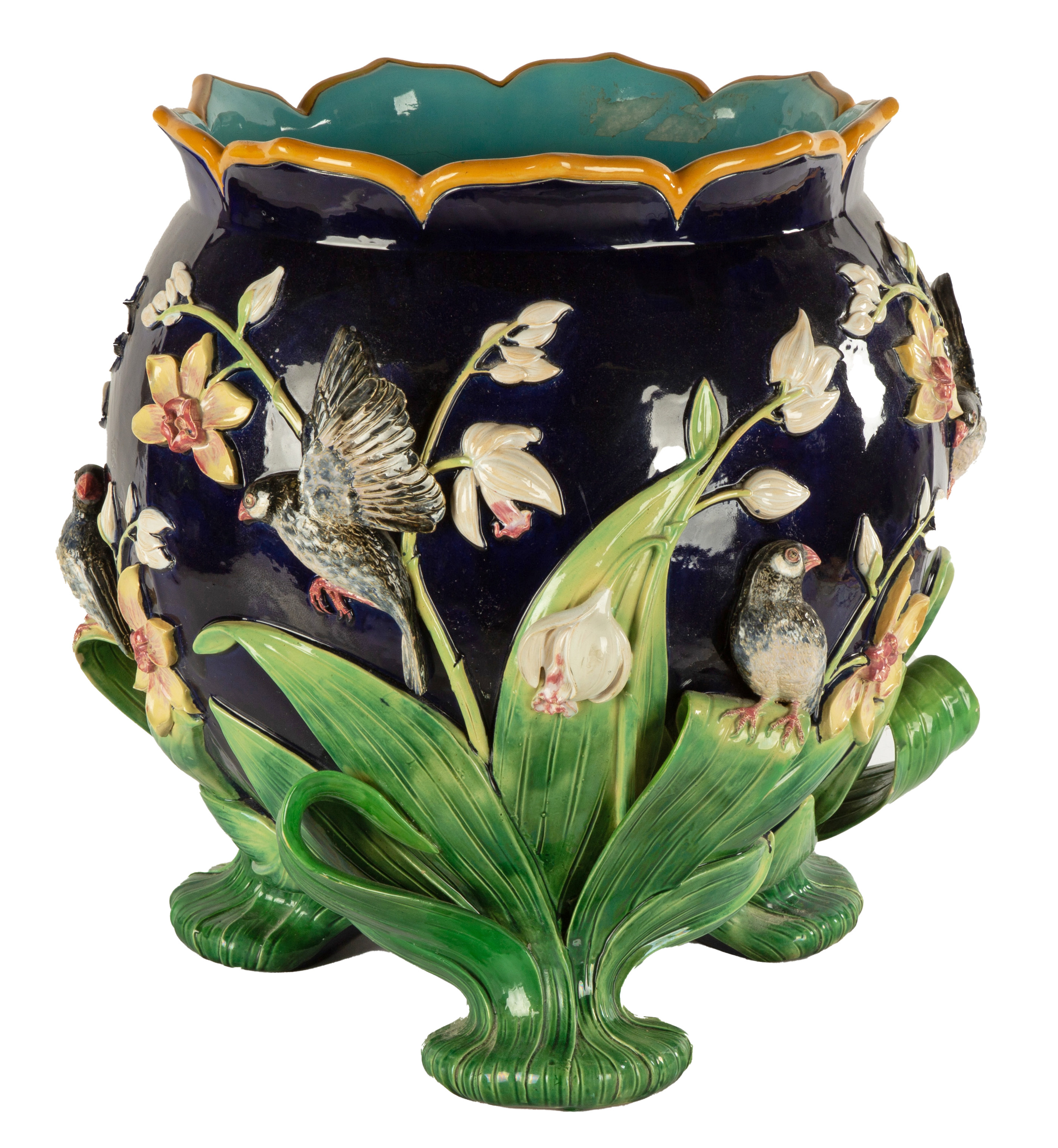 Appraisal: GEORGE JONES MAJOLICA JARDINIERE th century Decorated with birds among