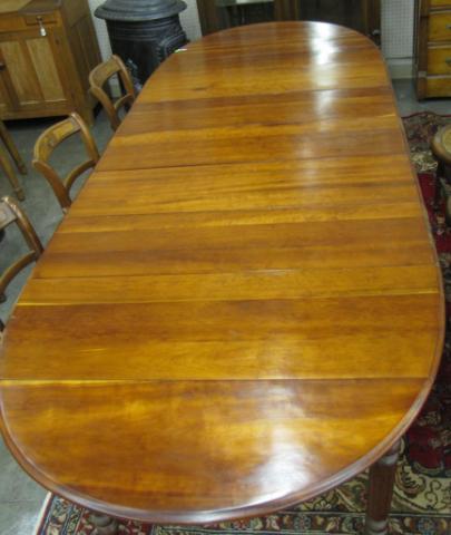 Appraisal: Cherry Drop Leaf Dining Table with five fluted legs and