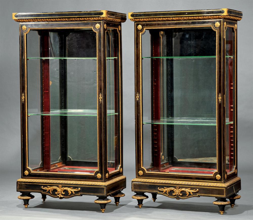 Appraisal: Pair of Louis XVI-Style Brass Inlaid Bronze-Mounted and Ebonized Vitrines