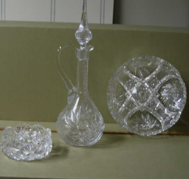 Appraisal: THREE PINWHEEL CUT GLASS SERVING PIECES Two bowls and handled