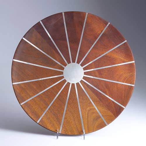 Appraisal: PAUL EVANS PHIL POWELL Turned wood and pewter charger in