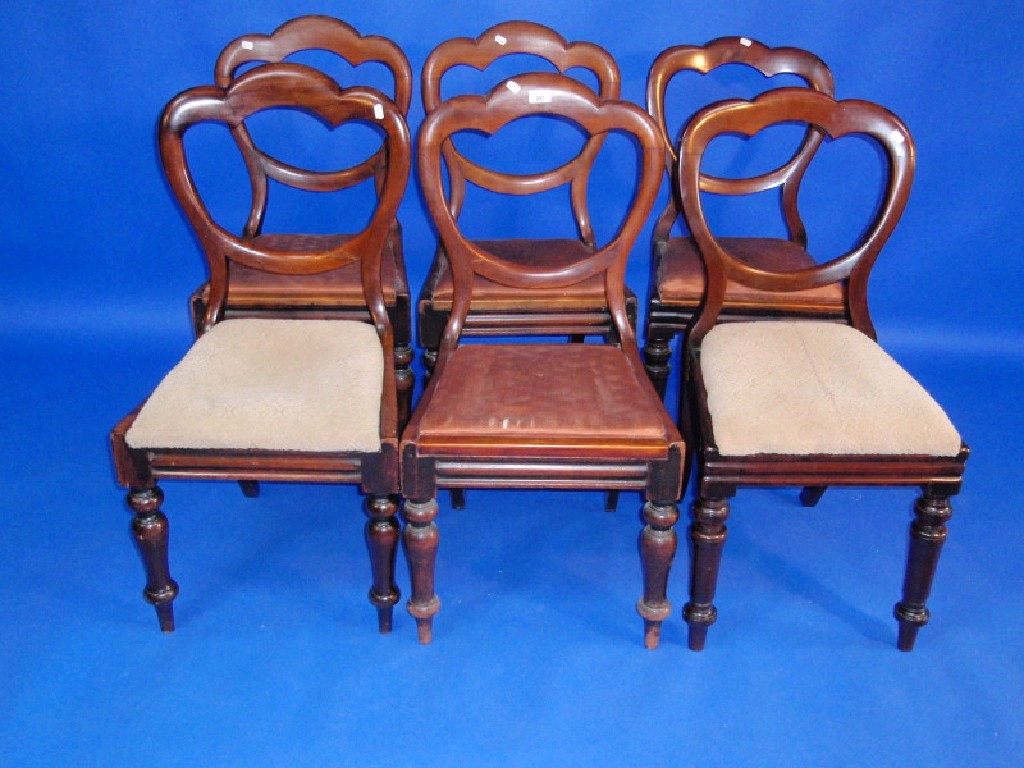 Appraisal: A set of six Victorian mahogany balloon back dining chairs