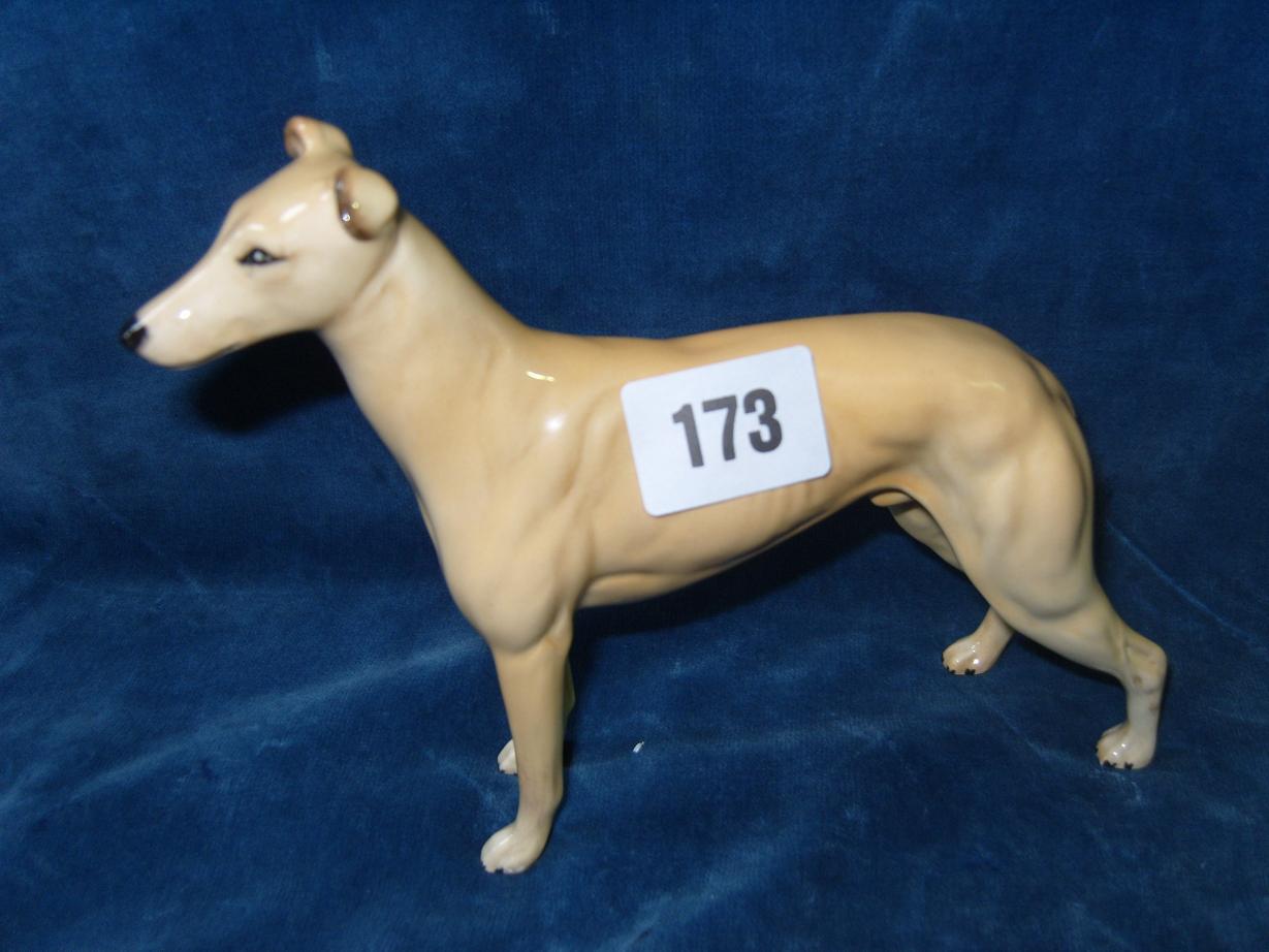 Appraisal: A Beswick model of a tan coloured greyhound marked to