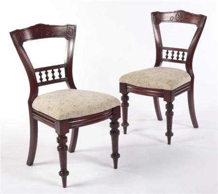 Appraisal: A set of twelve Victorian mahogany dining chairs the waisted