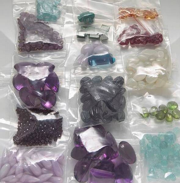 Appraisal: A collection of unmounted gem-stones including aquamarine jade amethyst tourmaline