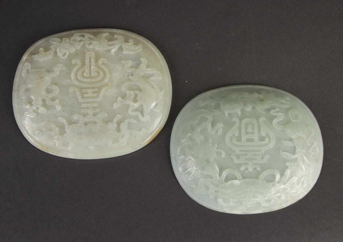 Appraisal: Chinese Carved White Jade Plaques Scroll designs Condition Some edge