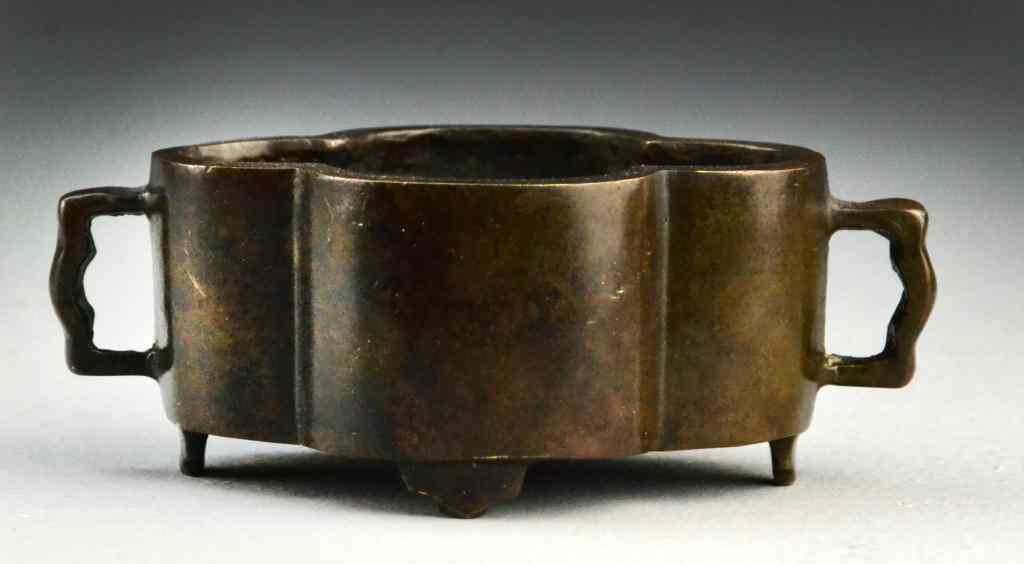 Appraisal: Chinese Qing Bronze CensorOf cartouche shape raised on ruyi shaped