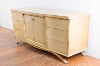 Appraisal: Mid-century blonde long dresser features two center doors with three