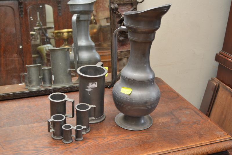 Appraisal: A SET OF PEWTER TANKARDS AND A JUG A SET