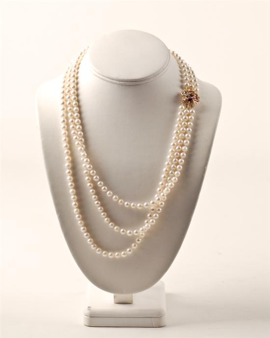 Appraisal: A Pearl Gold and Semi-precious Stone Necklace with three strands