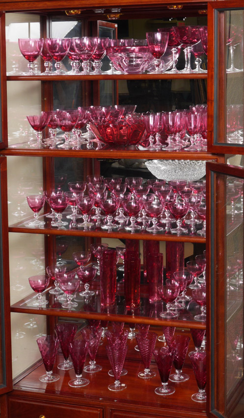 Appraisal: HUGE COLLECTION OF CRANBERRY GLASS A Curio cabinet full Sold