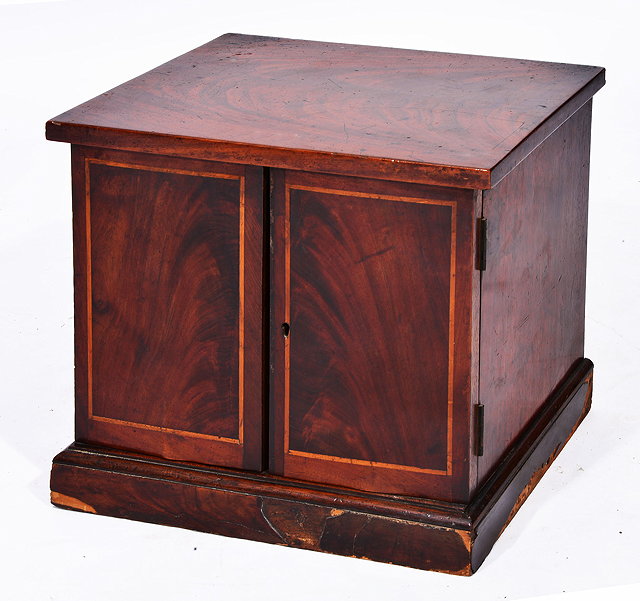 Appraisal: A VICTORIAN MAHOGANY TABLE CABINET the interior fitted four drawers