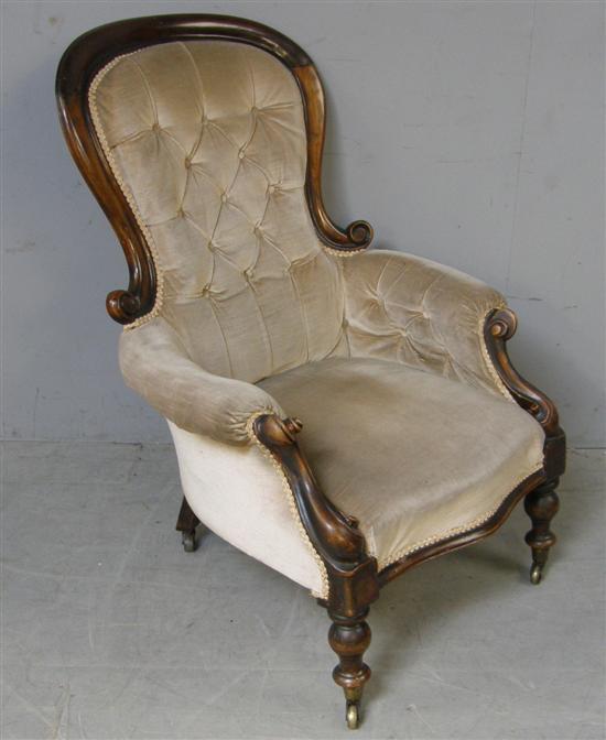 Appraisal: th century mahogany framed button back arm chair