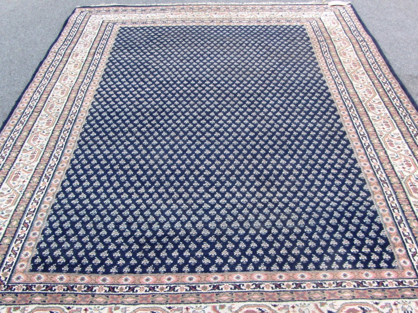 Appraisal: A Saraband carpet Persian the indigo field with an all