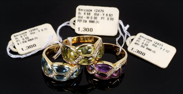 Appraisal: A matching set of three gem set rings each channel